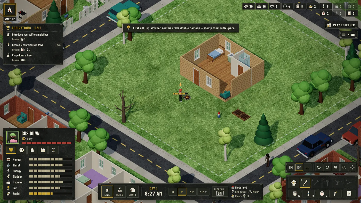 Isometric daytime view of a suburban lot. A survivor in a pink shirt stands on the lawn beside a small campfire, next to a cutaway single-storey house showing a bed, kitchen counter and bathroom. Roads, parked cars and neighbouring houses surround the lot; a garden gnome and a raised planter sit on the grass. Panels overlay the screen: an Aspirations list top left, a supply row of icons top right, a survivor card bottom left reading Gus Dunn, Okay, with bars for Hunger, Thirst, Energy, Bladder, Hygiene, Fun and Social, and a bottom bar reading Live, Build, Craft, Day 1, 8:27 AM, Free Will ON, Horde in 9d, Grid power, Water, Clear.